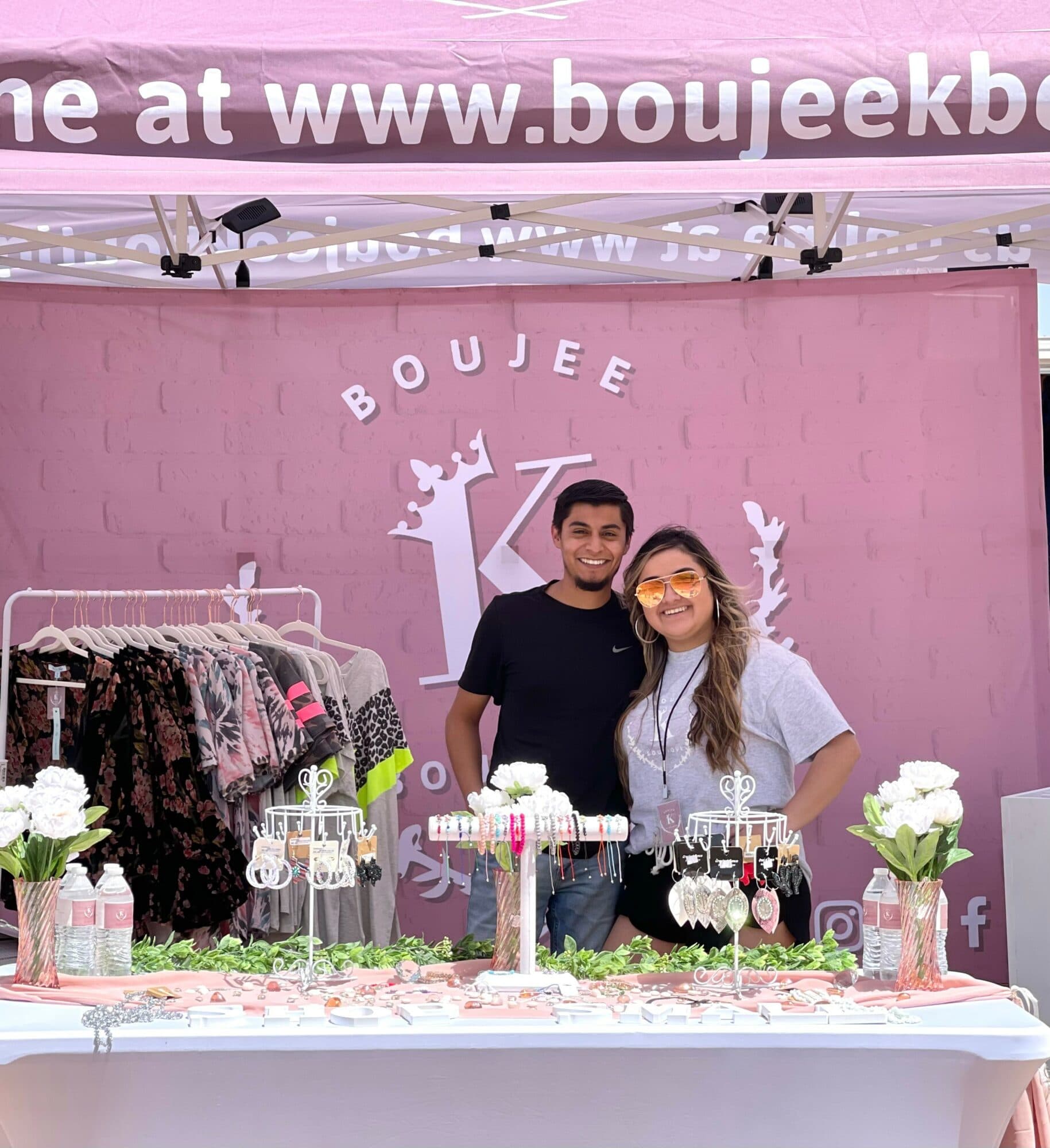 Karina and Malachi at a Boujee K Boutique popup